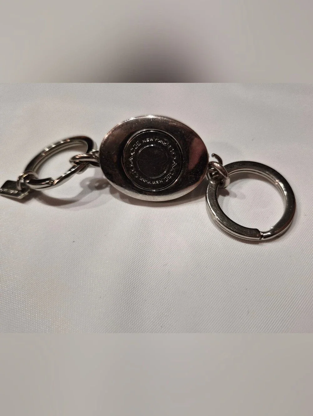 Coach Studded Leather Turnlock Keychain